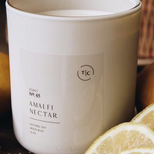The Chandlerie's Amalfi Nectar - a soy wax, wood wick candle in cream glass vessel