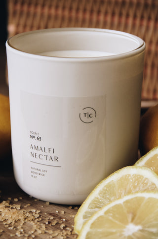 The Chandlerie's Amalfi Nectar - a soy wax, wood wick candle in cream glass vessel